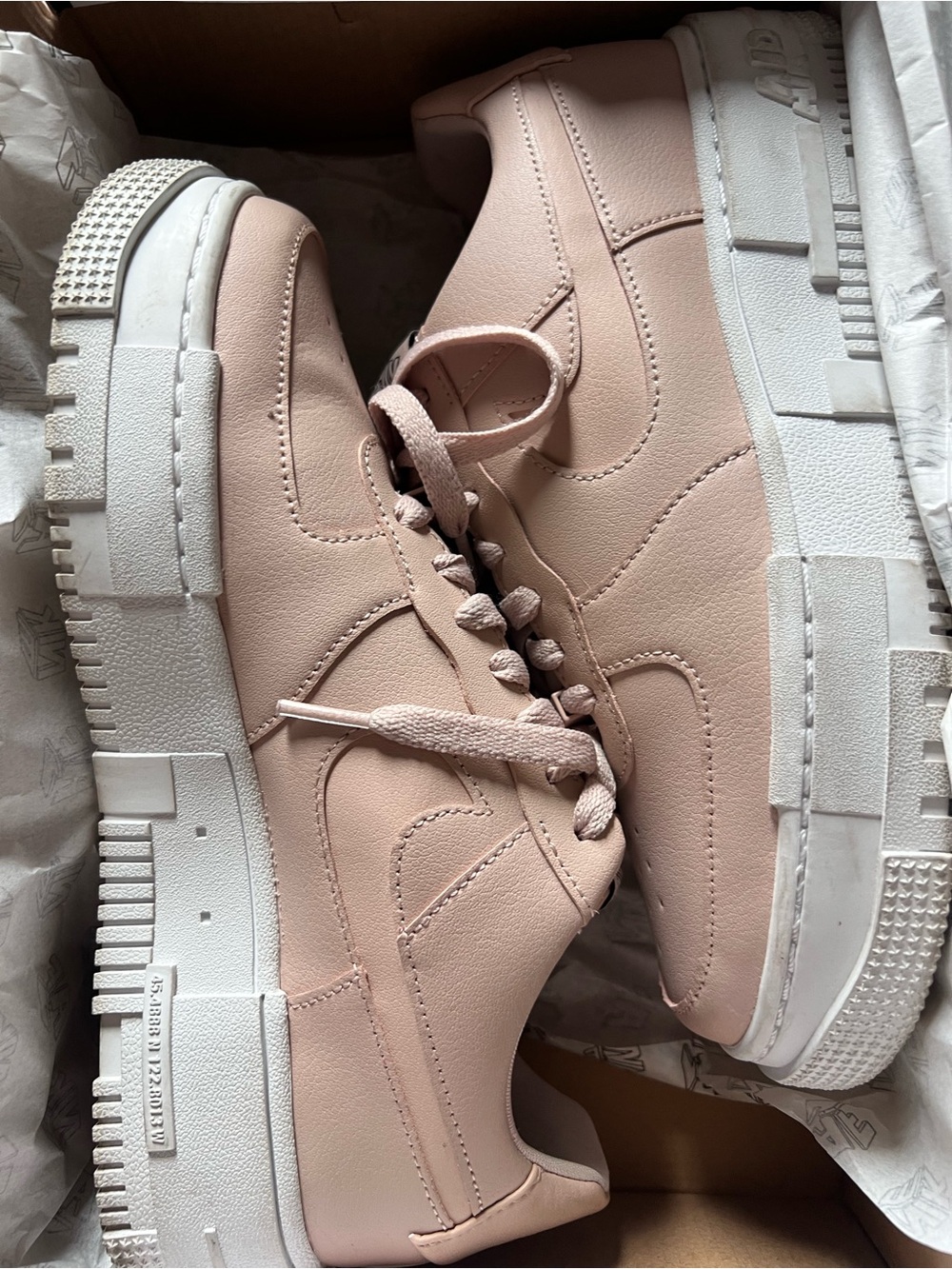 Nike Women’s Low-Top Sneakers in Blush Pink and White